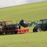 3785615-collecting-bales-of-hay.jpg